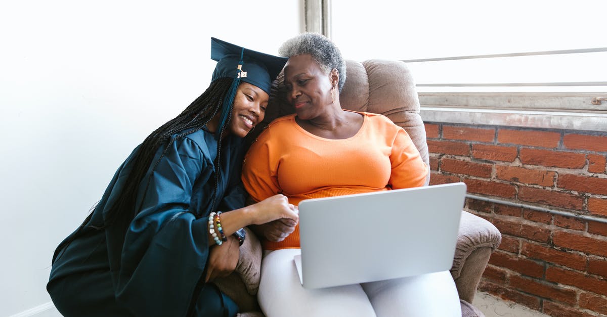 Applying for UK Visitor visa for daughter's graduation - A Woman in Graduation Dress Sitting Beside her Mother Applying for UK Visitor visa for daughter's graduation - A Woman in Graduation Dress Sitting Beside her Mother
