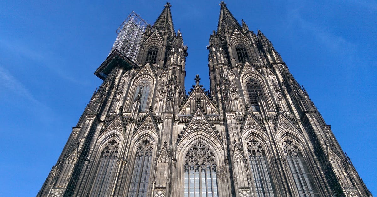 Approx how long will it take to go to Cologne Bonn Airport from Cologne city center? - Facade of Cathedral Against Blue Sky Approx how long will it take to go to Cologne Bonn Airport from Cologne city center? - Facade of Cathedral Against Blue Sky
