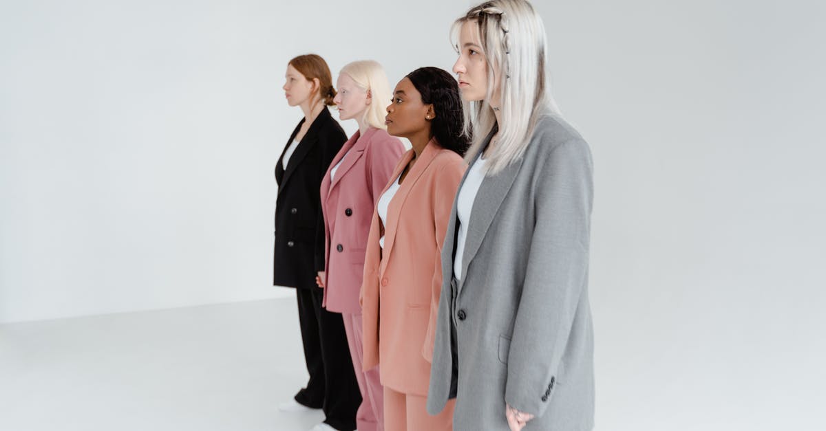 Are back-to-back working holidays in different countries possible? - Woman in Gray Blazer Standing Beside Woman in Pink Blazer Are back-to-back working holidays in different countries possible? - Woman in Gray Blazer Standing Beside Woman in Pink Blazer
