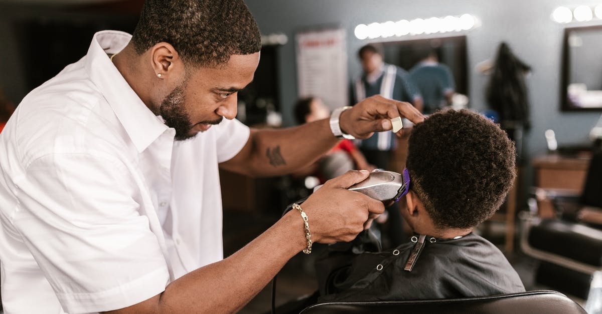 Are electric hair straighteners allowed on flights? - Man in White Dress Shirt Shaving Boy's Hair Are electric hair straighteners allowed on flights? - Man in White Dress Shirt Shaving Boy's Hair
