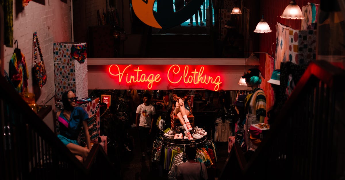 Are flights from London to Bucharest for real? COVID-19 - Neon sign in shop with vintage clothes Are flights from London to Bucharest for real? COVID-19 - Neon sign in shop with vintage clothes