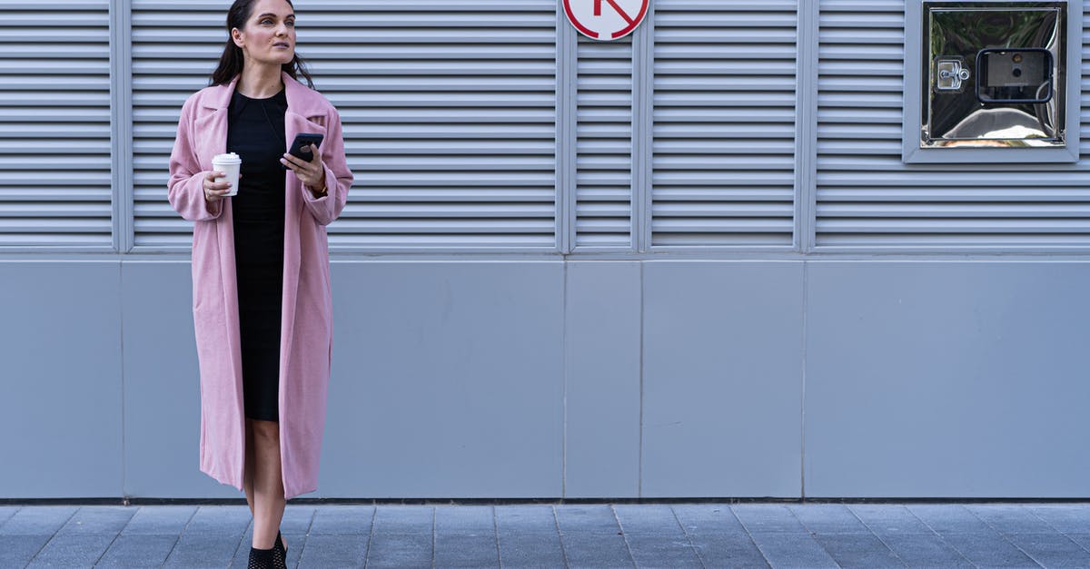 Are laws about sex outside marriage less rigorously enforced in Dubai for people on layovers? - Photo Of Woman Wearing Pink Coat