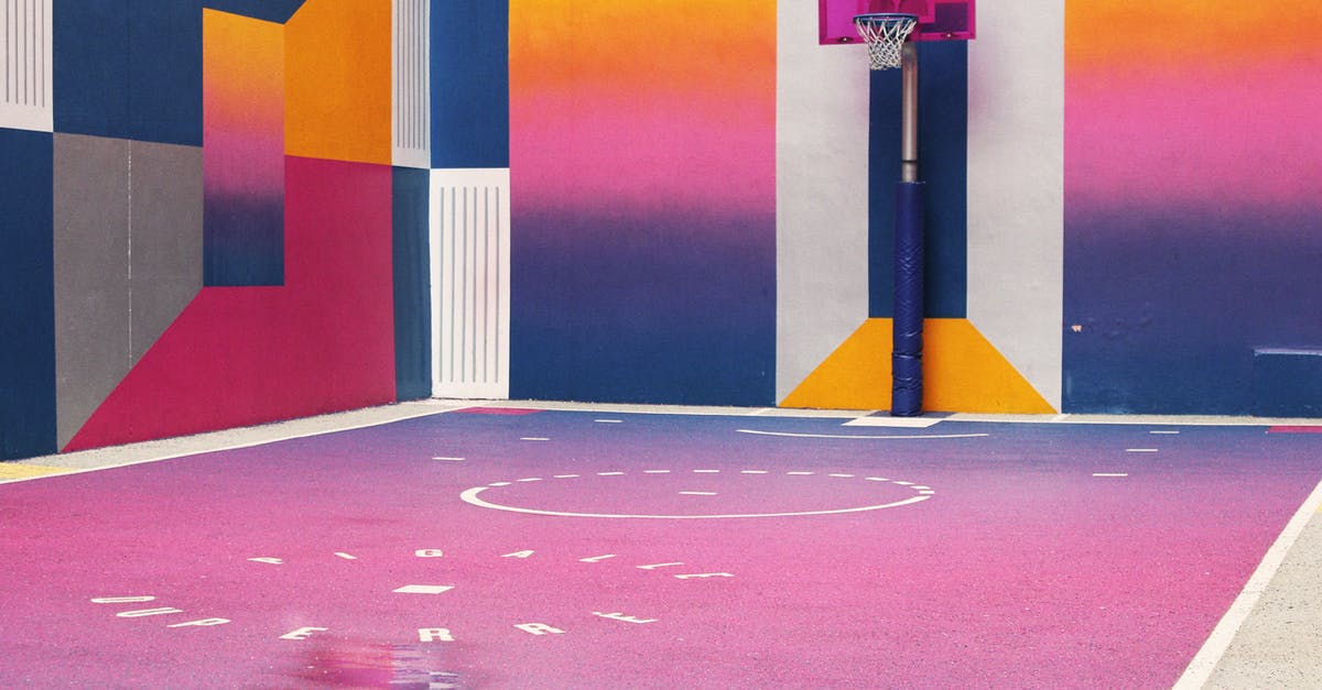 Are long-stay visas in France multi-entry by default? - Photo of Multi Colored Basketball Court