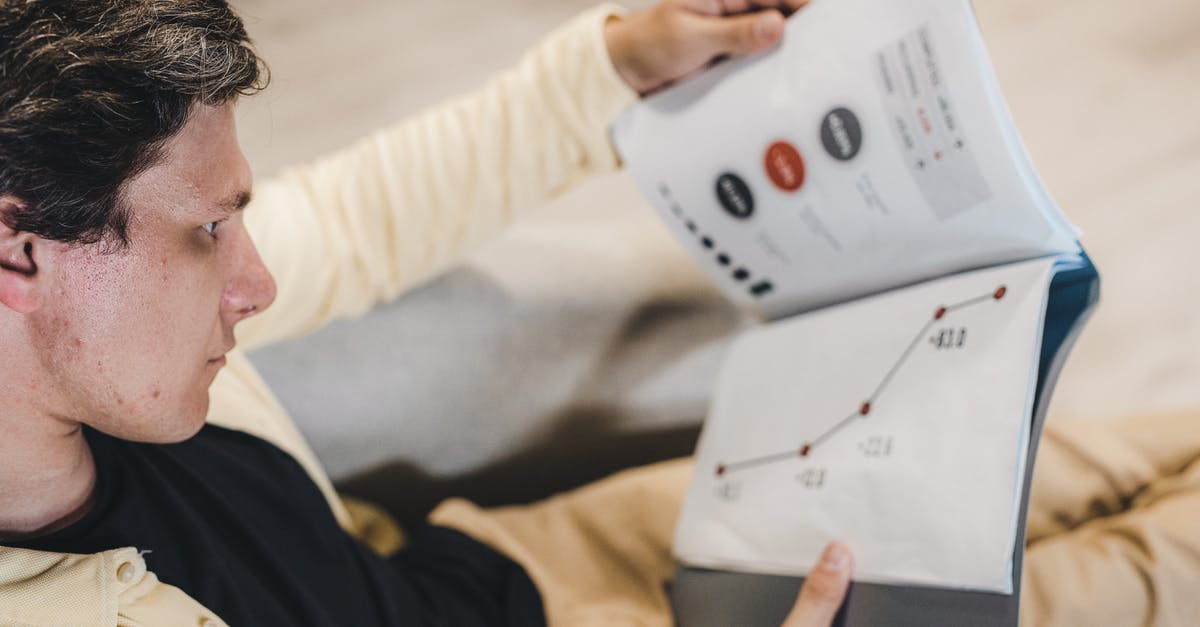 Are scanned and printed supporting documents accepted for UK visitor visa? - A Man Looking at a Graph Printed on Paper Are scanned and printed supporting documents accepted for UK visitor visa? - A Man Looking at a Graph Printed on Paper