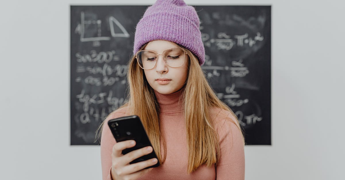 Are student ID discounts region specific? - Woman in Orange Shirt Holding Black Smartphone Are student ID discounts region specific? - Woman in Orange Shirt Holding Black Smartphone