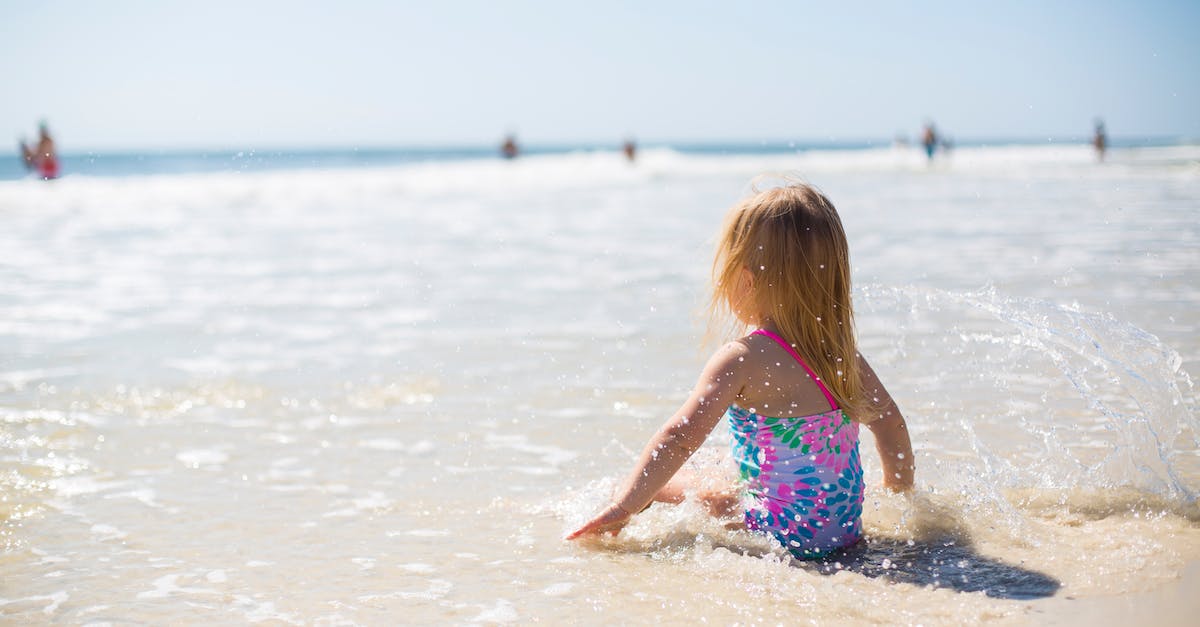 Are swimming costumes required for hot springs in New Zealand? - Girl Sitting on Shore Are swimming costumes required for hot springs in New Zealand? - Girl Sitting on Shore