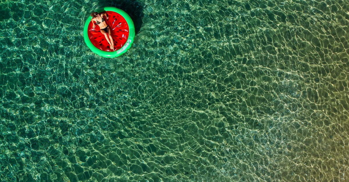 Are the beaches in Rosarito Mexico clean enough for swimming? - Woman Lying on Floater Are the beaches in Rosarito Mexico clean enough for swimming? - Woman Lying on Floater