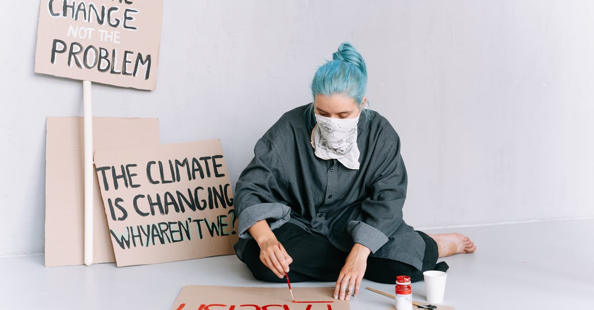 Are the Finnish and Udmurt languages mutually intelligible? - A Woman Sitting on the Floor Writing Protests on a Placard Are the Finnish and Udmurt languages mutually intelligible? - A Woman Sitting on the Floor Writing Protests on a Placard
