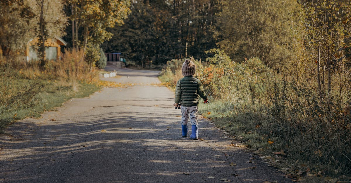 Are the roads in Norway in good condition? - Boy Walking on Road Are the roads in Norway in good condition? - Boy Walking on Road