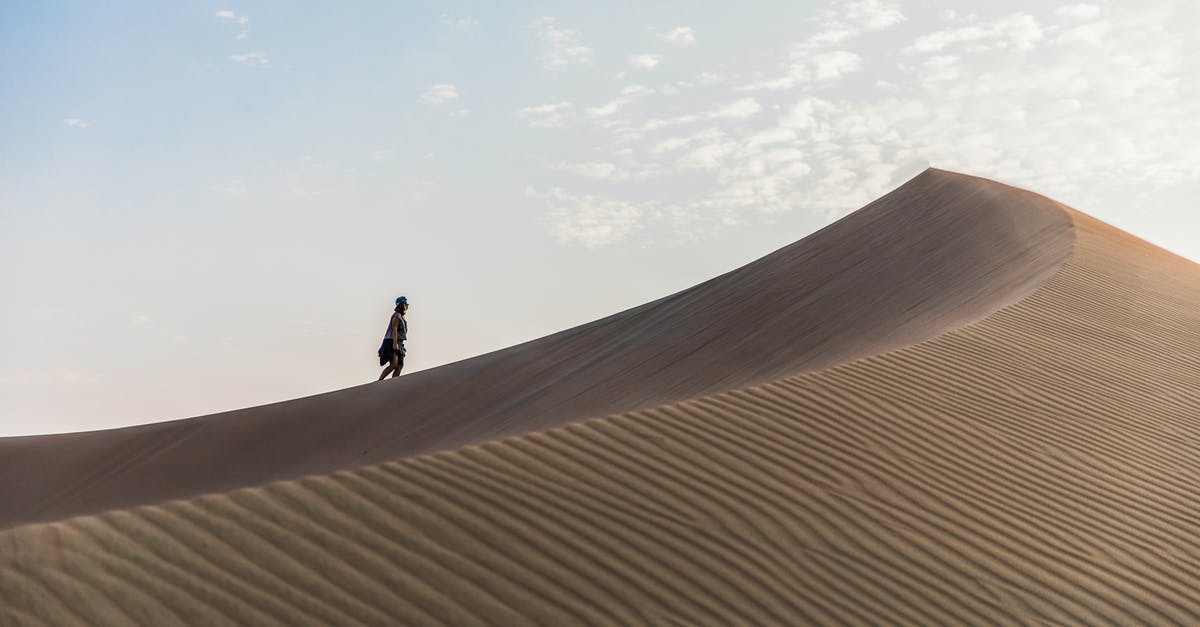 Are the sand dunes at Knolls, UT safe to visit? - Person Walking on Desert Are the sand dunes at Knolls, UT safe to visit? - Person Walking on Desert