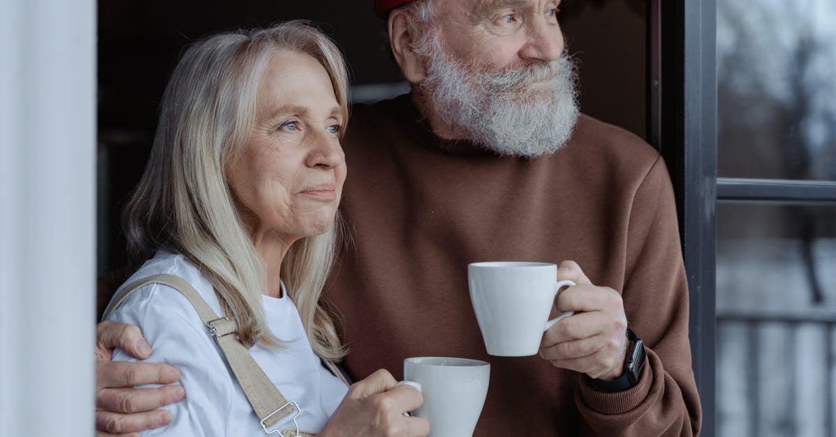 Are there age restrictions to stay in some hostels? - Man and Woman Holding White Ceramic Mugs Are there age restrictions to stay in some hostels? - Man and Woman Holding White Ceramic Mugs