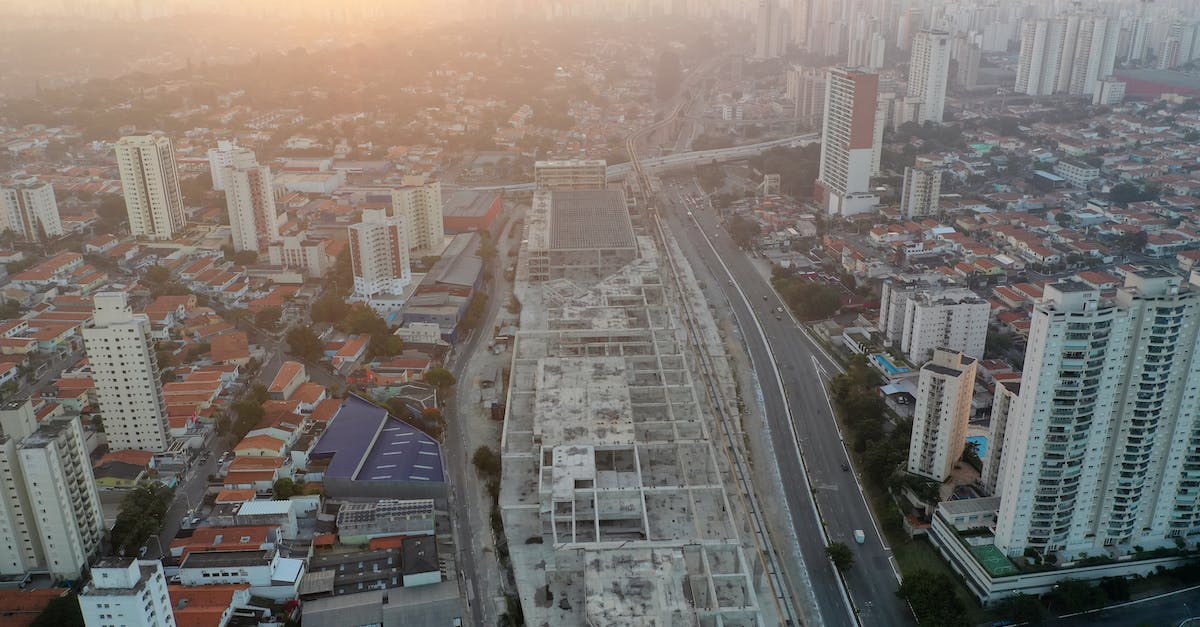 Are there air traffic routes that are turbulence-sensitive? - Modern city district with skyscrapers at sunset Are there air traffic routes that are turbulence-sensitive? - Modern city district with skyscrapers at sunset