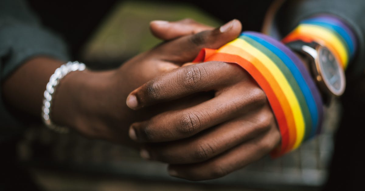 Are there any active, regularly scheduled commercial flights that are reserved for only one gender or other demographic factor? - Crop anonymous African American homosexual male wearing colorful rainbow ribbon on arm while sitting on street with hands clasped Are there any active, regularly scheduled commercial flights that are reserved for only one gender or other demographic factor? - Crop anonymous African American homosexual male wearing colorful rainbow ribbon on arm while sitting on street with hands clasped