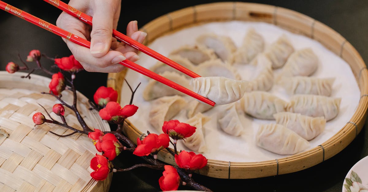 Are there any Australian war memorials I shouldn't take Japanese visitors to? [closed] - From above of crop unrecognizable worker taking dumpling from steamer with chopsticks near branch of Japanese cherry
