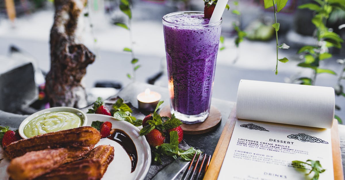 Are there any cafes serving breakfast in Bakewell / Peak District that are open around 8 AM on Sundays? - From above of glass of lavender creme brulee garnished with strawberry and plate of churro with avocado sauce placed on table with knife and fork and menu and candle against window decorated with plants Are there any cafes serving breakfast in Bakewell / Peak District that are open around 8 AM on Sundays? - From above of glass of lavender creme brulee garnished with strawberry and plate of churro with avocado sauce placed on table with knife and fork and menu and candle against window decorated with plants