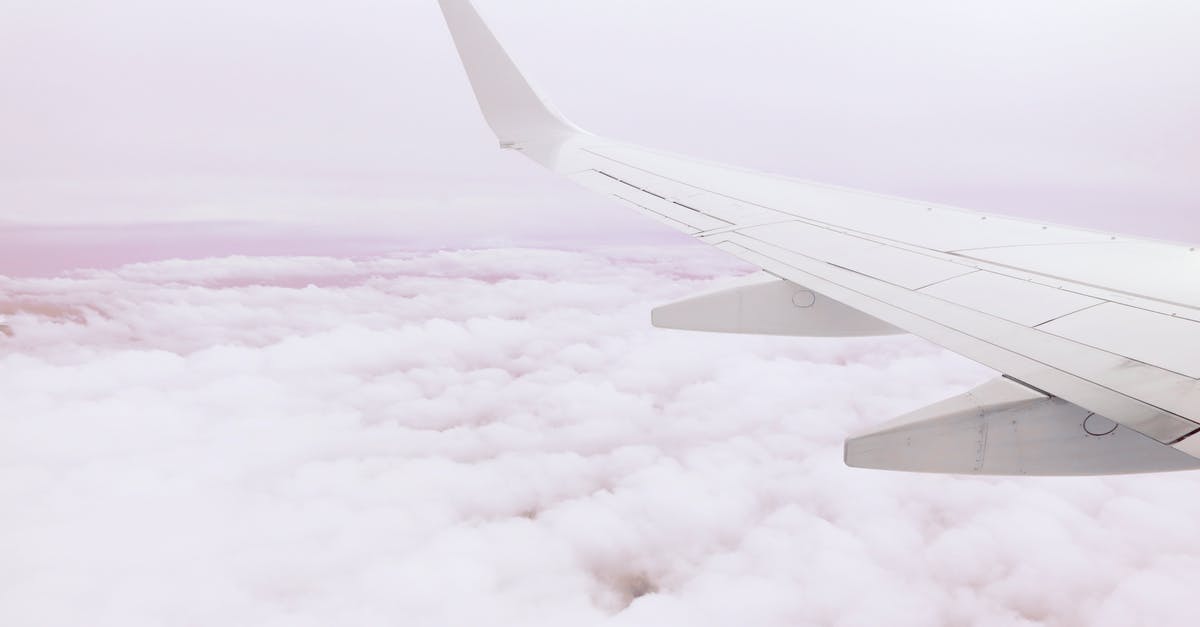Are there any flights which fly above the Bermuda Triangle? - Photo of Airplane Wing Above the Clouds Are there any flights which fly above the Bermuda Triangle? - Photo of Airplane Wing Above the Clouds