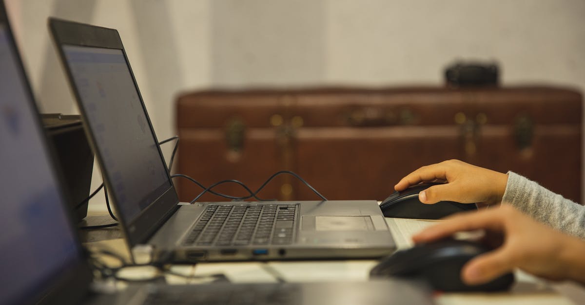 Are there any limitations to using Revolut or similar cards in Berlin? [duplicate] - Faceless pupils using mouses of laptops during lesson in school