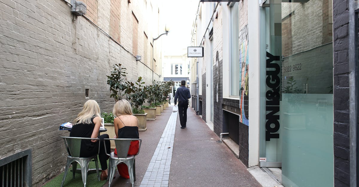 Are there any Pre-Paid SIM cards available for Tourists in Brazil? [duplicate] - People Walking Down the Street and Sitting in Cafe Patios in a City 