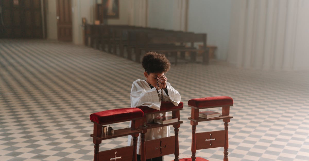Are there any Taizé worship services in Bergen? - Man in White Dress Shirt Sitting on Red Wooden Chair Are there any Taizé worship services in Bergen? - Man in White Dress Shirt Sitting on Red Wooden Chair