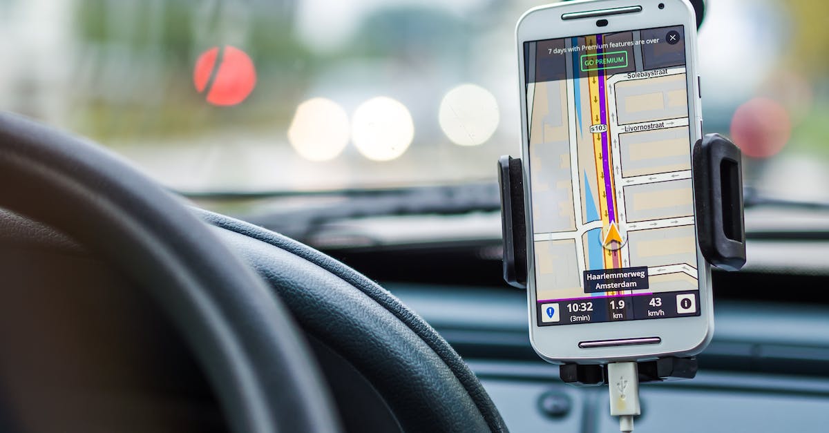 Are there cheap GPS or other navigator devices with downloadable maps for the whole world? - White Android Smartphone Inside Vehicle Are there cheap GPS or other navigator devices with downloadable maps for the whole world? - White Android Smartphone Inside Vehicle