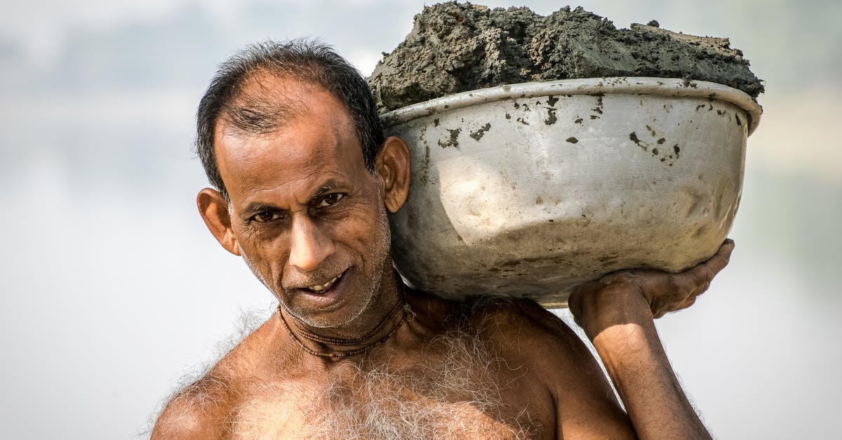 Are there crowd-sourced websites for travel bucket lists? - Man Carrying Bucket of Mud Are there crowd-sourced websites for travel bucket lists? - Man Carrying Bucket of Mud