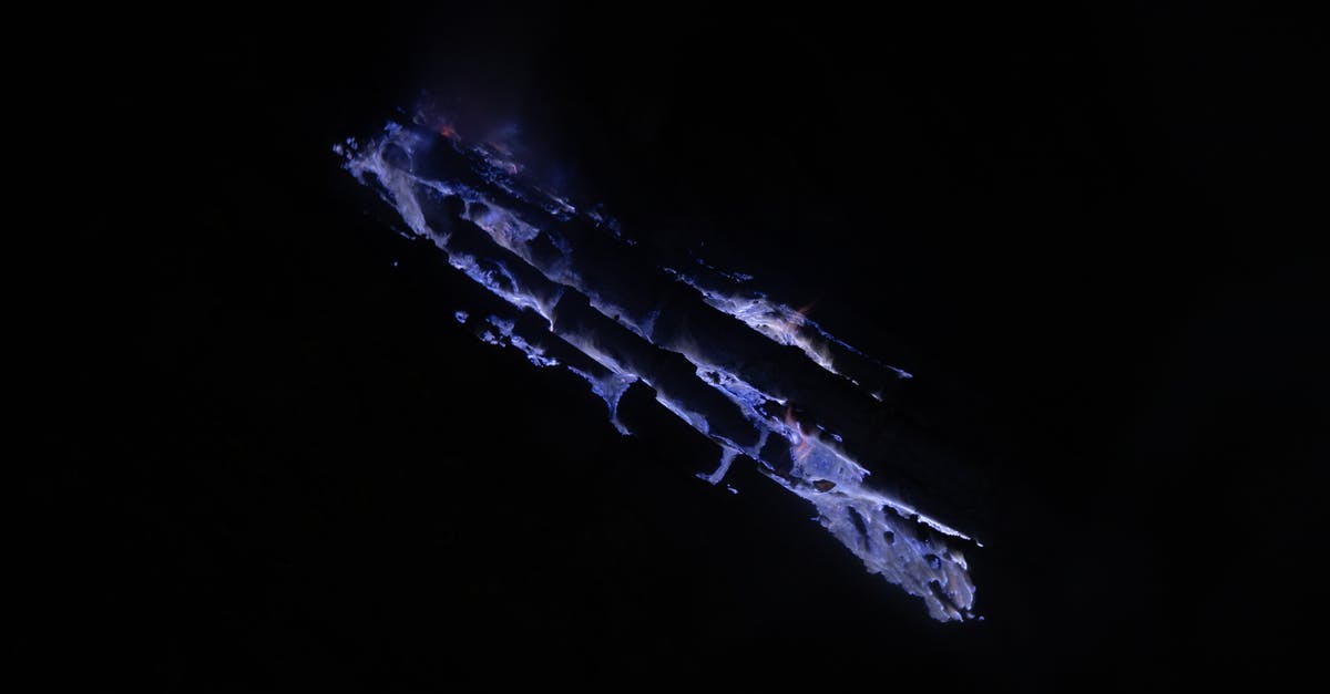 Are there Ijen Crater tours from Bali that finish at Yogyakarta? [closed] - Blue flames in volcano crater at night