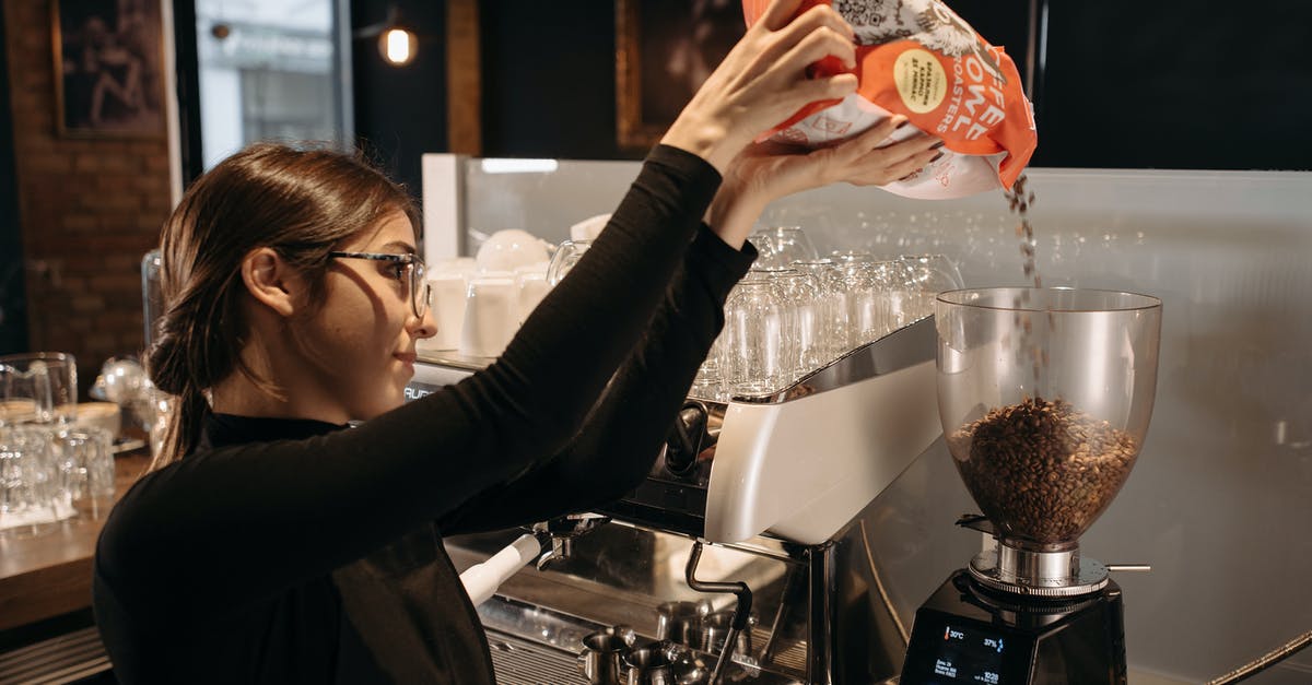 Are there known bans on the Machine Readable section of some UK Passports? - A Woman in Black Long Sleeves Pouring Coffee Beans in a Grinder Are there known bans on the Machine Readable section of some UK Passports? - A Woman in Black Long Sleeves Pouring Coffee Beans in a Grinder