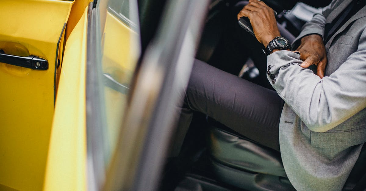 Are there less expensive sources for yellow-fever vaccinations? - Side view of crop anonymous African American male in elegant suit checking wristwatch in car Are there less expensive sources for yellow-fever vaccinations? - Side view of crop anonymous African American male in elegant suit checking wristwatch in car