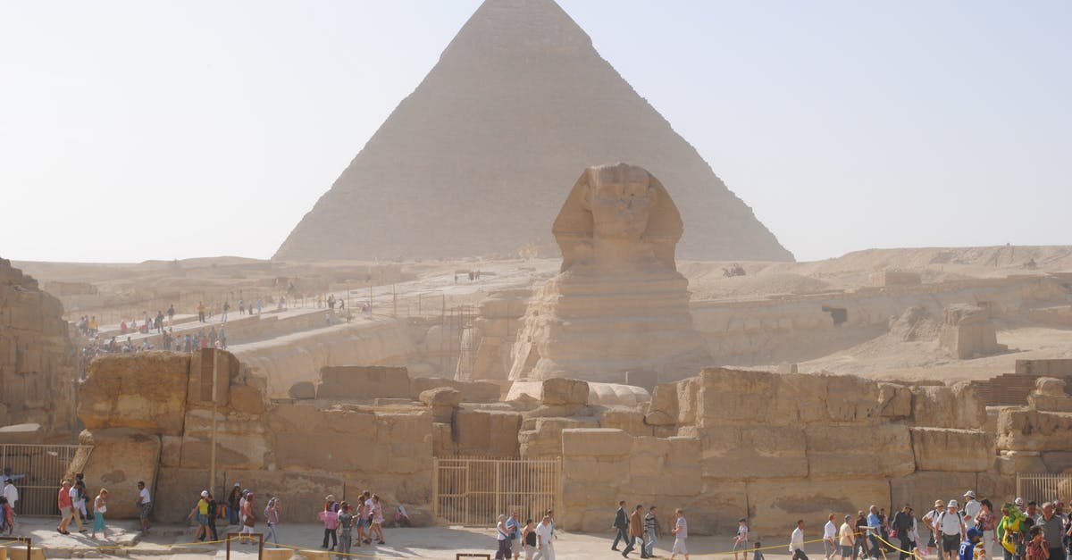 Are there "Doctor Who" themed tourist attractions in the UK? - Unrecognizable distant travelers walking on old path near ancient Sphinx statue and Great Pyramid of Giza located in Egypt on sunny day Are there "Doctor Who" themed tourist attractions in the UK? - Unrecognizable distant travelers walking on old path near ancient Sphinx statue and Great Pyramid of Giza located in Egypt on sunny day