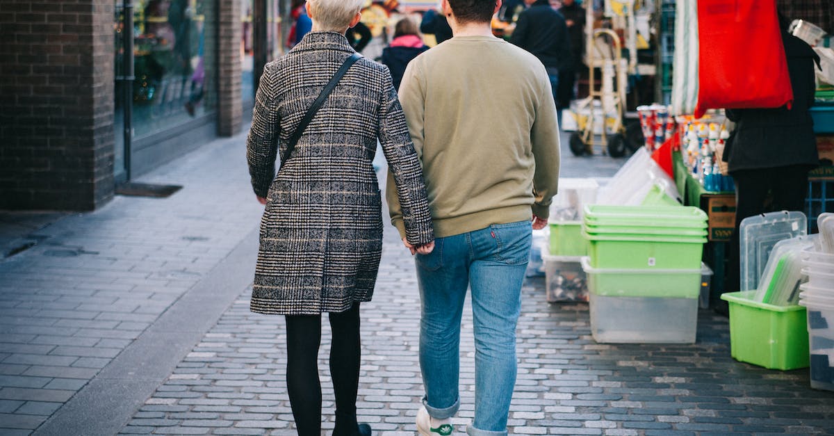 Are there really walking groups in malls in the US? - Man and Woman Standing Near Store Are there really walking groups in malls in the US? - Man and Woman Standing Near Store