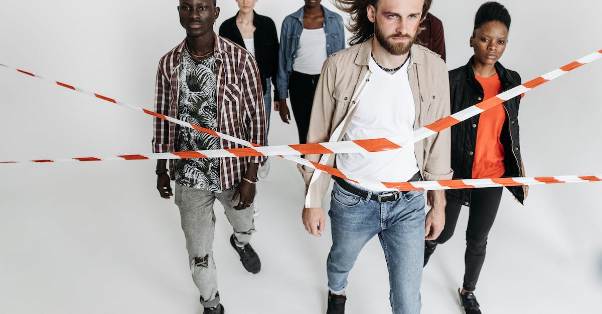 Are there really walking groups in malls in the US? - Group of People Passing a Barricade Tape Are there really walking groups in malls in the US? - Group of People Passing a Barricade Tape