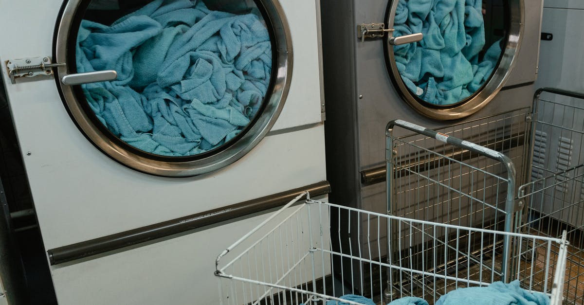 Are there self-service laundries in Arendal? - White and Gray Washing Machine with Blue Fabrics inside Are there self-service laundries in Arendal? - White and Gray Washing Machine with Blue Fabrics inside