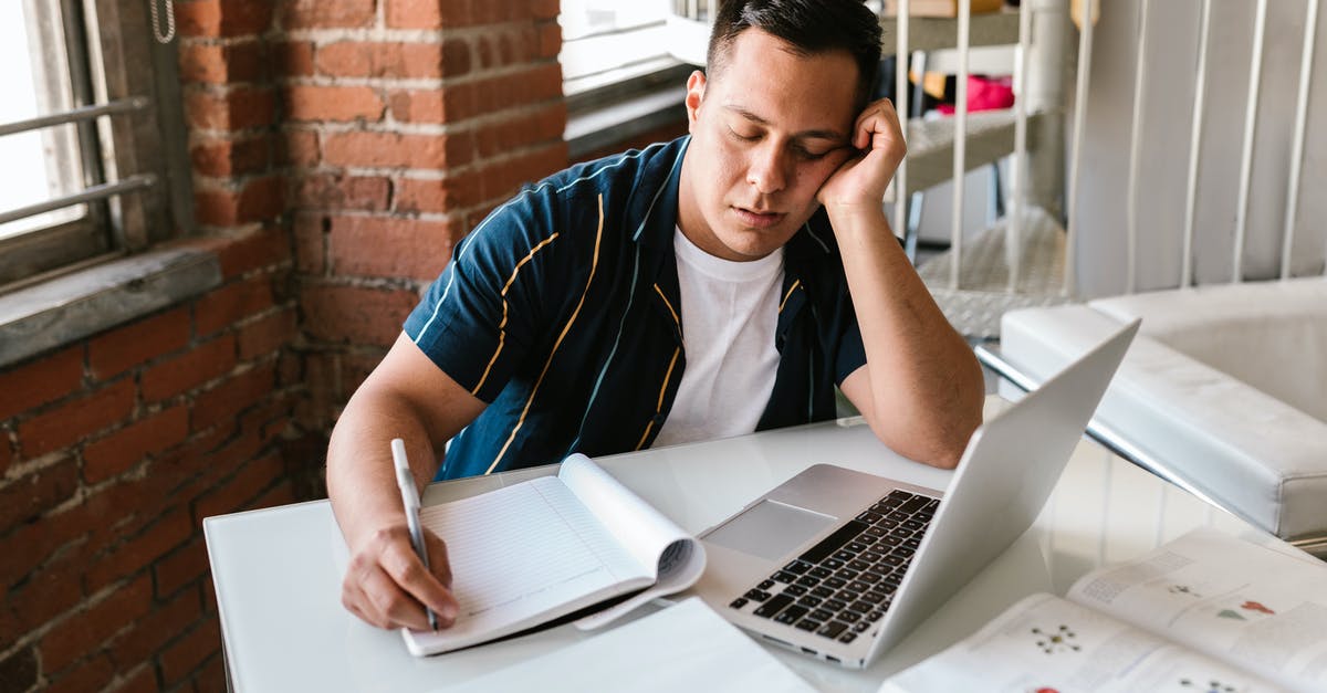 Are there showers / sleeping facilities at SFO? - Man in Blue and Black Stripe Polo Shirt Using Macbook Are there showers / sleeping facilities at SFO? - Man in Blue and Black Stripe Polo Shirt Using Macbook