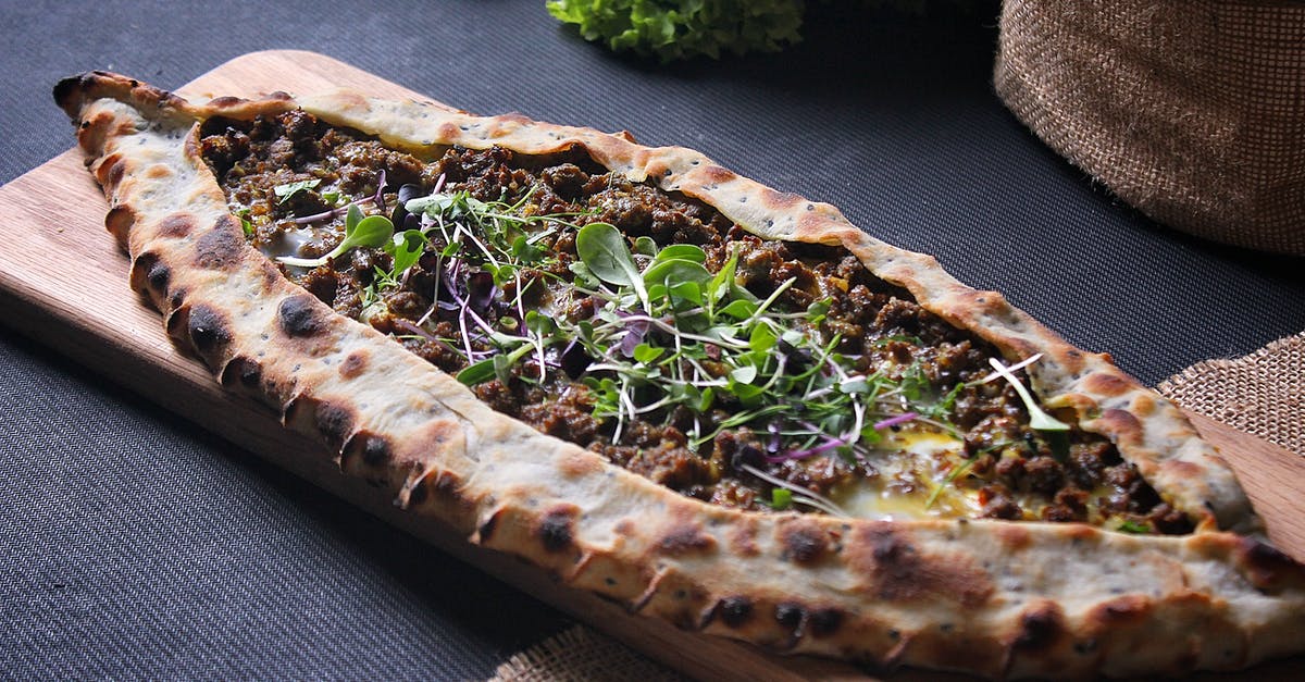 Are there sites where I can sell an Italian train ticket? [closed] - Close-up of Italian Pizza on Board