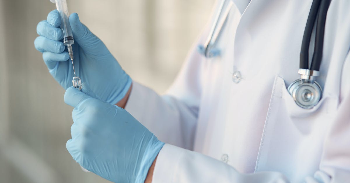 Are there sterile transfer areas in Juan Santamaria airport? - Person in White Long Sleeve Shirt Holding Injection Are there sterile transfer areas in Juan Santamaria airport? - Person in White Long Sleeve Shirt Holding Injection