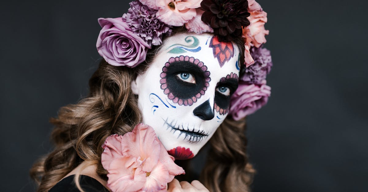 Are there tips and tricks to overcome a fear of flying? - Young female with sugar skull make up and hair decorated with flowers for celebrating Halloween Are there tips and tricks to overcome a fear of flying? - Young female with sugar skull make up and hair decorated with flowers for celebrating Halloween