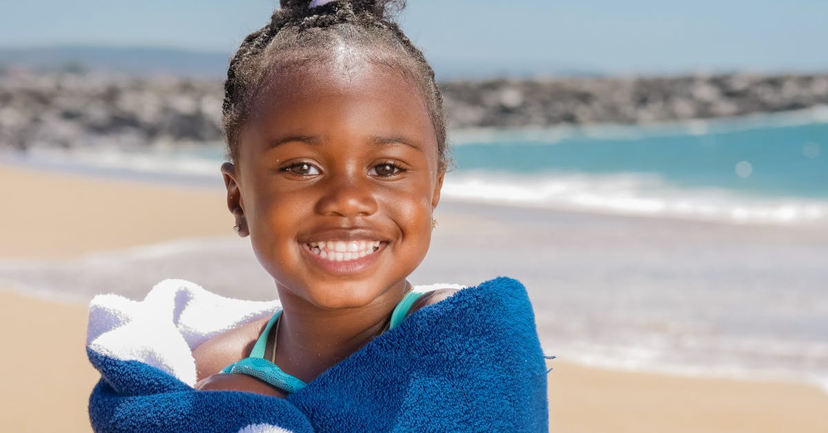 Are Turkey Black Sea beaches suitable for bathing in summer? - Smiling Girl Wrapped in Blue and White Towel Are Turkey Black Sea beaches suitable for bathing in summer? - Smiling Girl Wrapped in Blue and White Towel