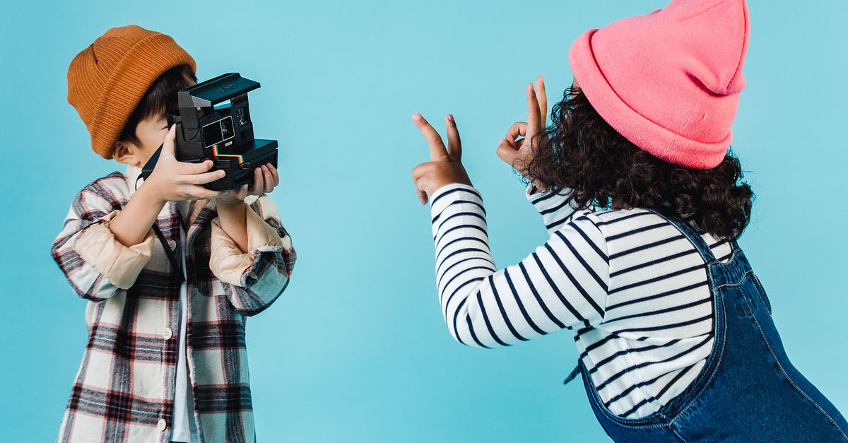 Are you allowed to take pictures inside the Tomb of Ramesses? - Positive diverse children taking photo on instant photo camera Are you allowed to take pictures inside the Tomb of Ramesses? - Positive diverse children taking photo on instant photo camera