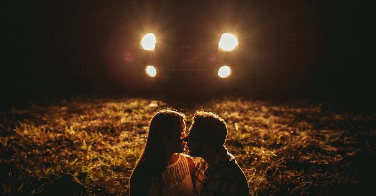 Arriving at night before Schengen visa valid date? [duplicate] - Photo of Man and Woman Looking Up