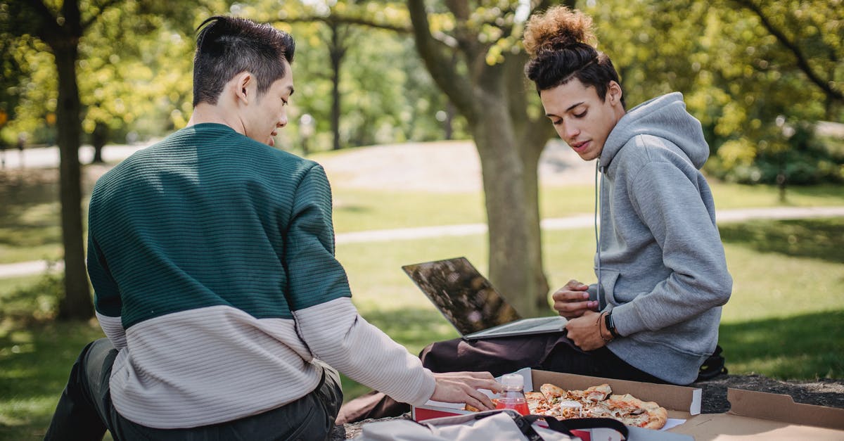 Arriving in France before the start of a Student Visa. Can I go to the UK and come back to France? - Diverse students eating pizza while studying with laptop in park Arriving in France before the start of a Student Visa. Can I go to the UK and come back to France? - Diverse students eating pizza while studying with laptop in park