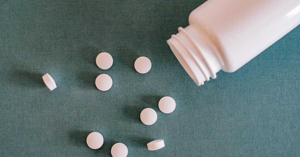 As a tourist in the EU, can you order prescription drugs from your home country? [closed] - Pile of white pills with container