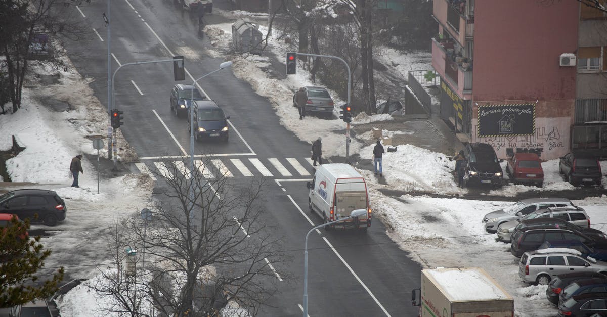 As an Australian driving in South Africa, what differences in traffic or road rules do I need to know? - Parked Cars on Snow Covered Ground As an Australian driving in South Africa, what differences in traffic or road rules do I need to know? - Parked Cars on Snow Covered Ground