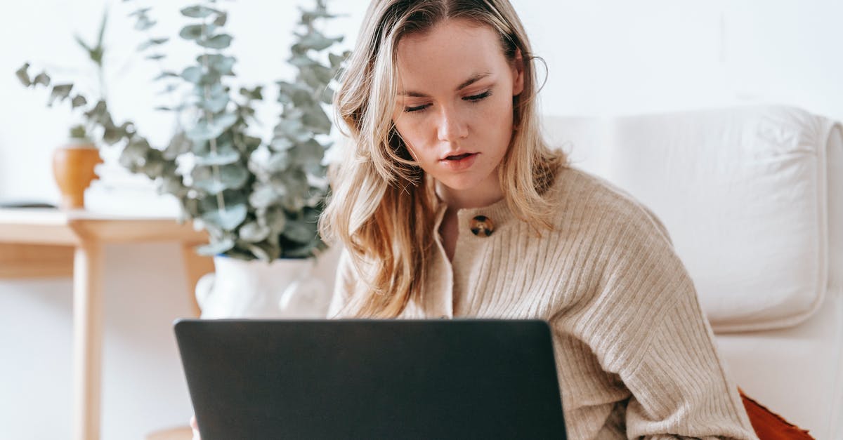 As an non EU applicant can i study masters in switzerland and search for jobs in Germany? [closed] - Serious female remote specialist working online on netbook on blurred background of interior of lounge