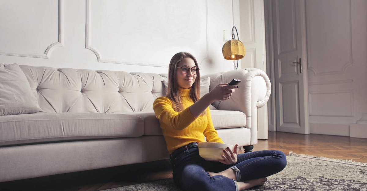 As Singapore Airlines (Krisflyer) Gold, can I bring my family into the lounge on a domestic Virgin Australia flight? - Young woman relaxing at home and watching movie As Singapore Airlines (Krisflyer) Gold, can I bring my family into the lounge on a domestic Virgin Australia flight? - Young woman relaxing at home and watching movie