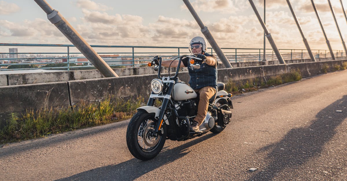 Australian ETA with Reckless Driving (misdemeanor) - Black and White Motorcycle Parked on Gray Concrete Road Australian ETA with Reckless Driving (misdemeanor) - Black and White Motorcycle Parked on Gray Concrete Road