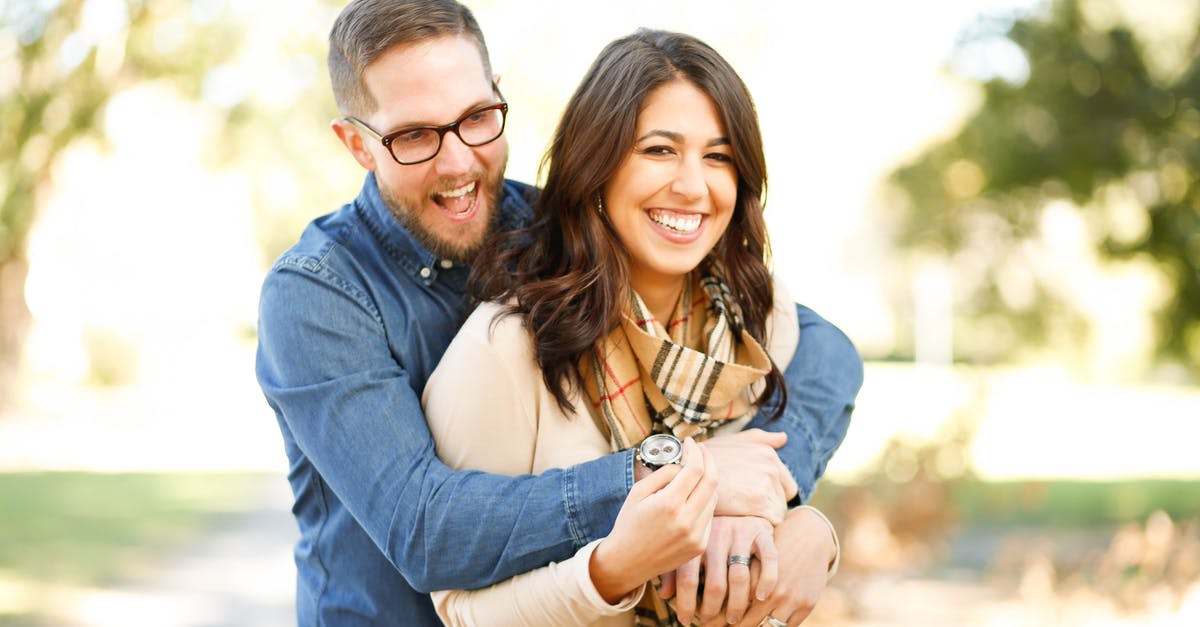Australian immigration long-stay 457 visa - do we need to pay tax on our engagement ring? [closed] - Portrait of Happy Young Woman Using Mobile Phone in City