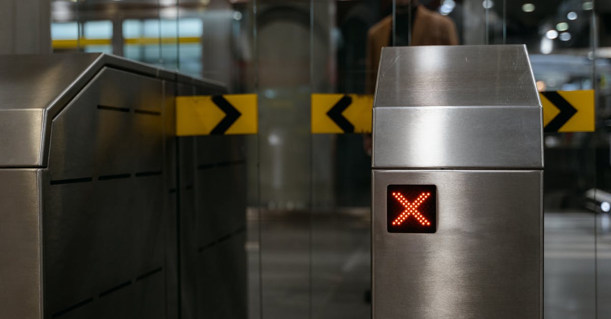 Automatic Visa Re validation (US) - Automatic Entrance Ticket Gate at Subway Entrance with an LED X Sign Automatic Visa Re validation (US) - Automatic Entrance Ticket Gate at Subway Entrance with an LED X Sign