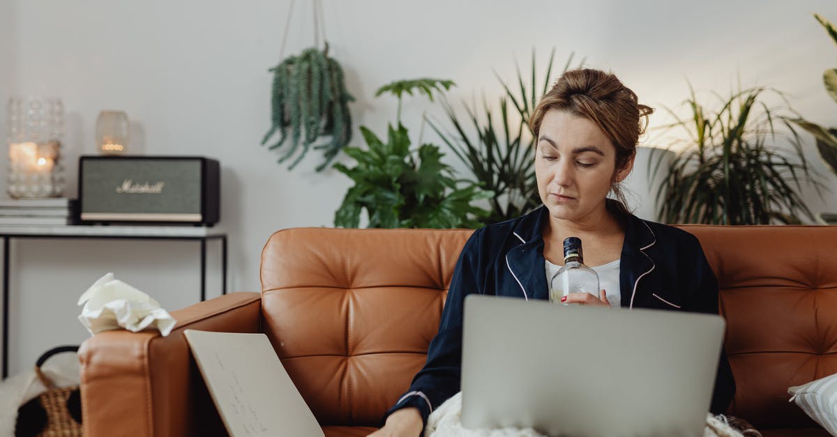 Availability of alcohol in Morocco? - A Woman Sitting on a Sofa with a Laptop Availability of alcohol in Morocco? - A Woman Sitting on a Sofa with a Laptop