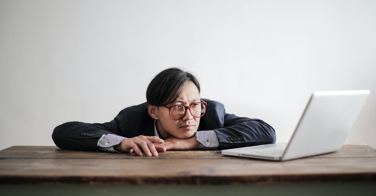 B1/B2 rejected twice for business purpose, implications and wait times - Bored formal man watching laptop at desk B1/B2 rejected twice for business purpose, implications and wait times - Bored formal man watching laptop at desk