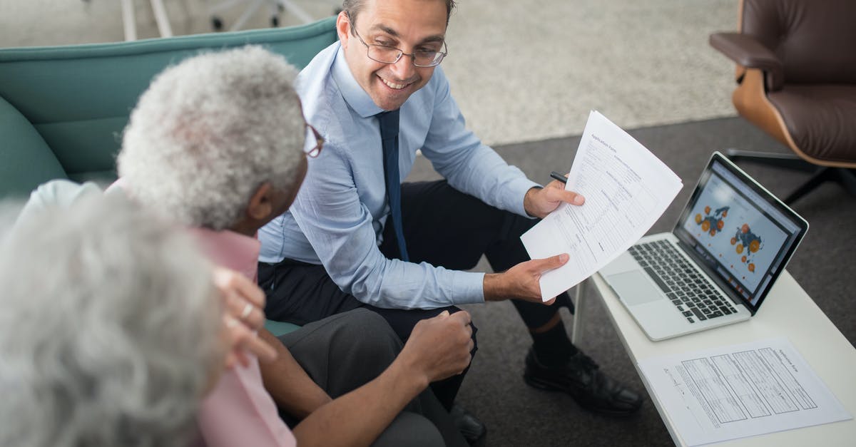 B-1/B-2 Visa Working with US clients - An Agent Showing Documents to an Elderly Man B-1/B-2 Visa Working with US clients - An Agent Showing Documents to an Elderly Man